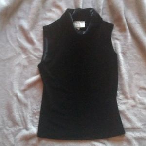 Black sleeveless turtleneck top